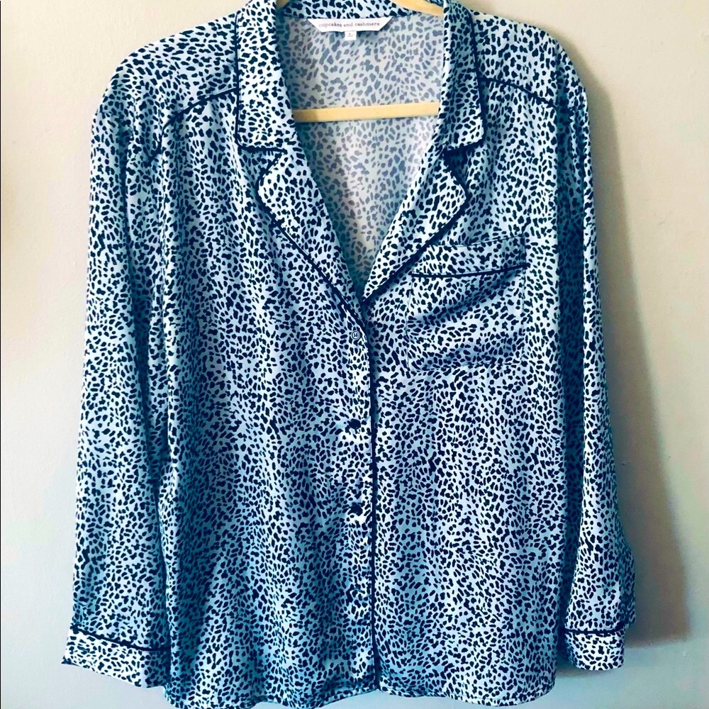 Pajama style blouse. Sky blue with black dots and black trim.